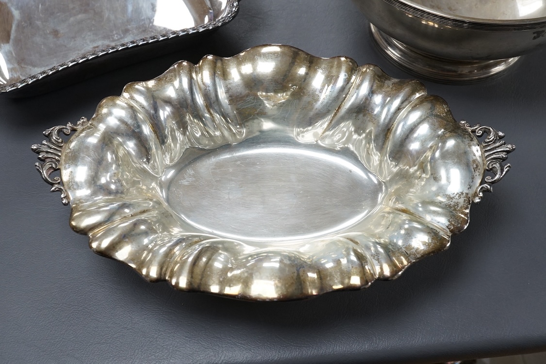 A 20th century Portuguese 833 standard fruit bowl, diameter 20cm, together with an Italian 800 standard two handled dish and a French 950 standard dish, gross 43.2oz.